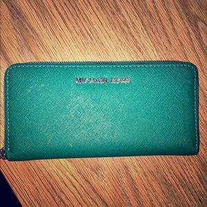 Teal Michael Kors zip wallet
