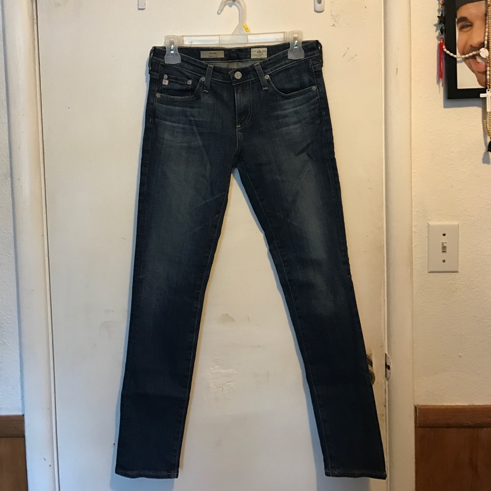 The slit cigarette leg AG denim medium wash