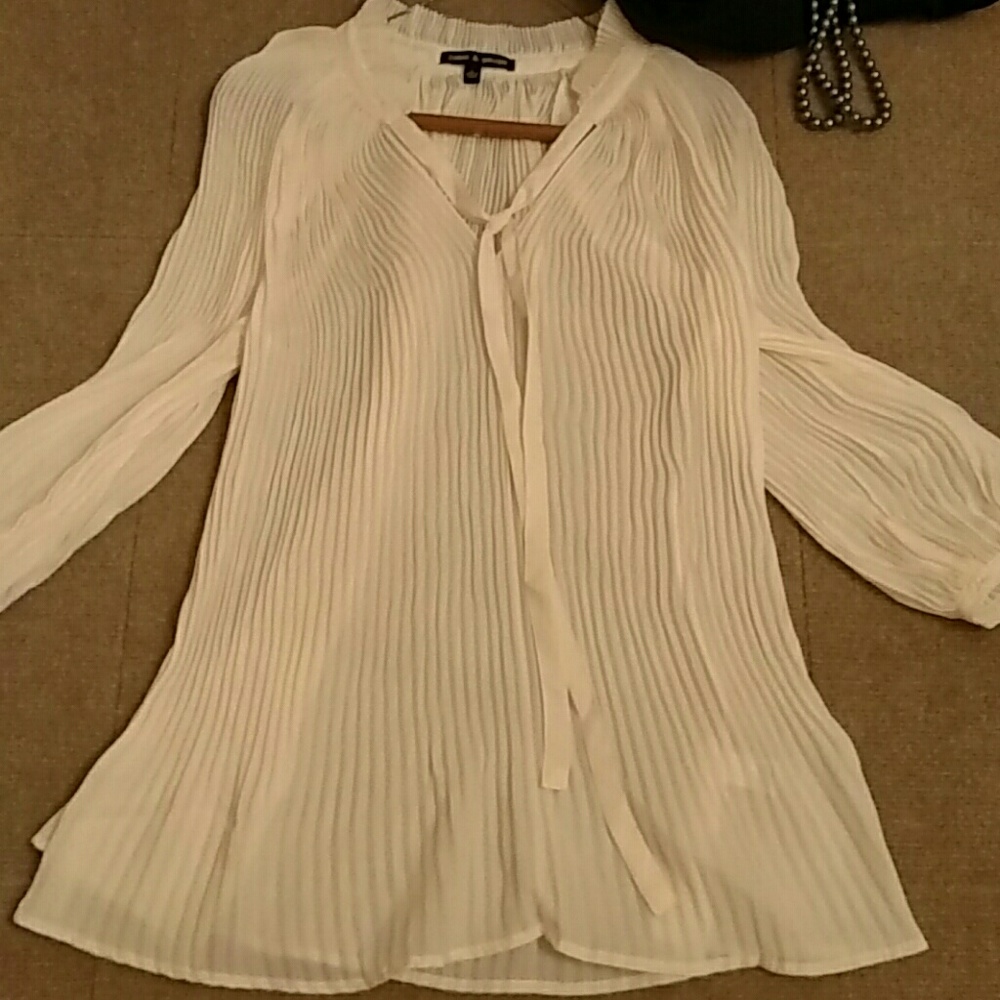 Beige blouse.