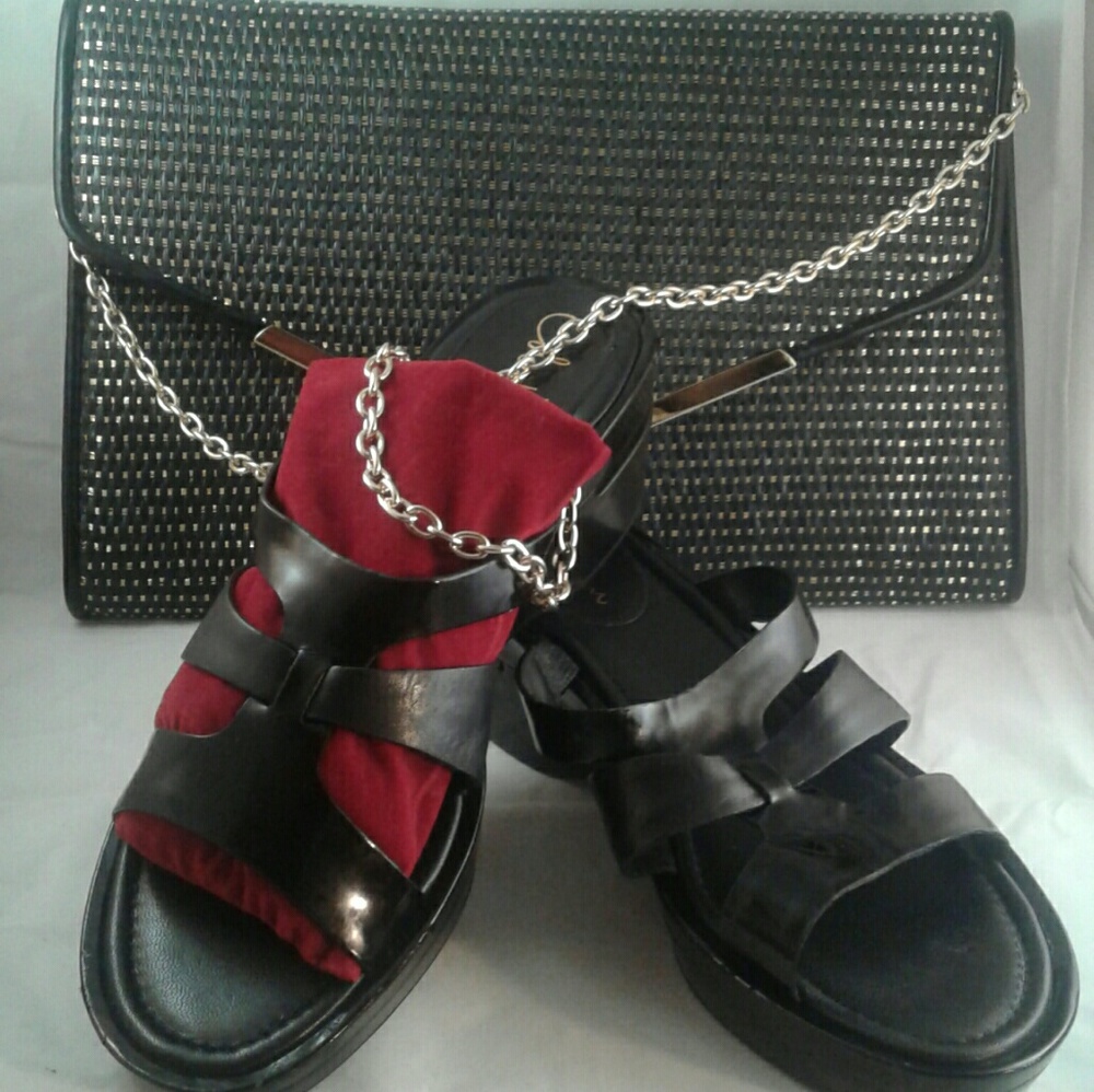 Black clucth with gold details