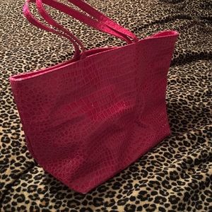 Pink faux croc Bath & body works bag.