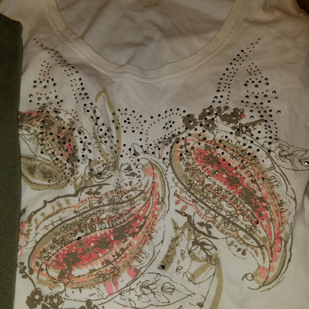 2 quater length sleeve shirts.