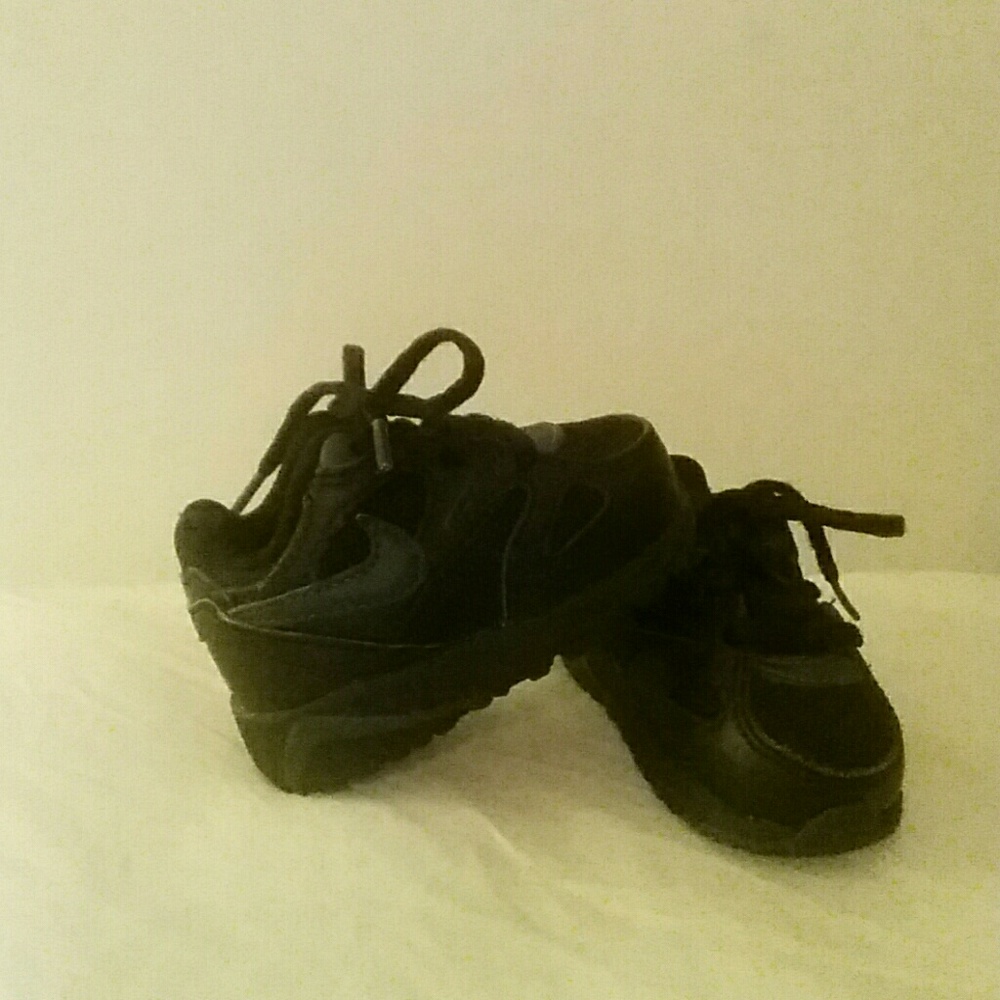 Brand new, never worn, baby Nike sneakers.