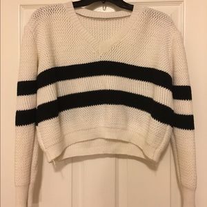 Cropped white sweater with black stripes