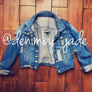 Distressed denim jacket