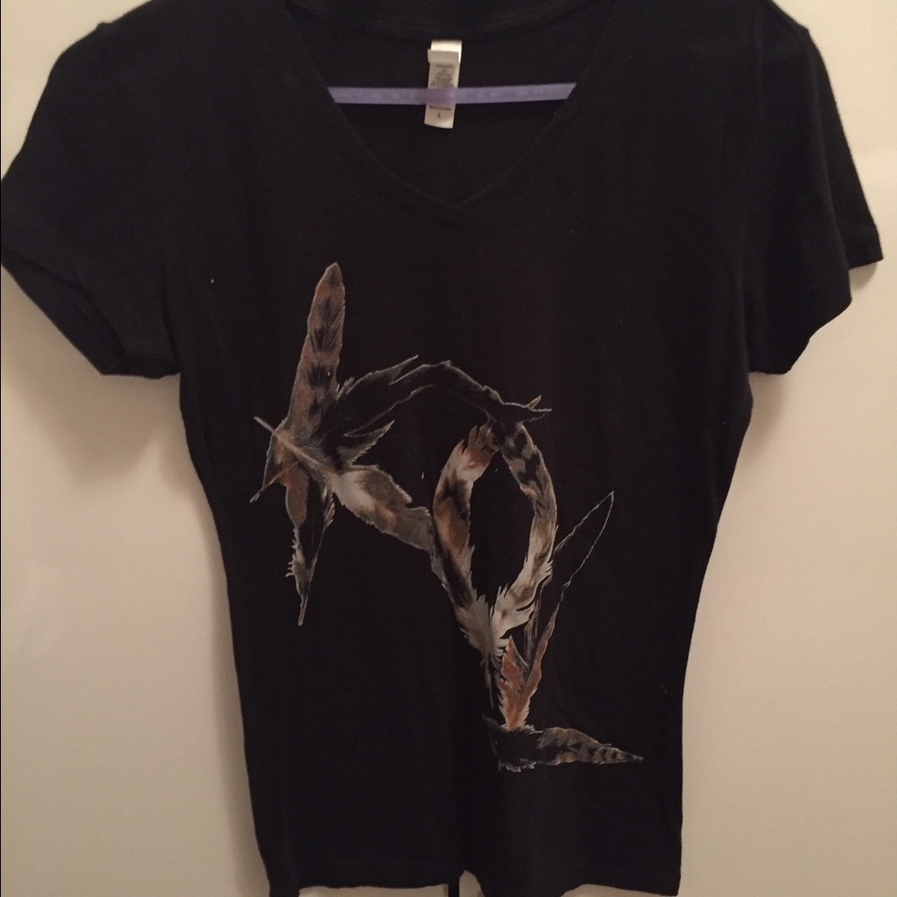 Kings of Leon band shirt.