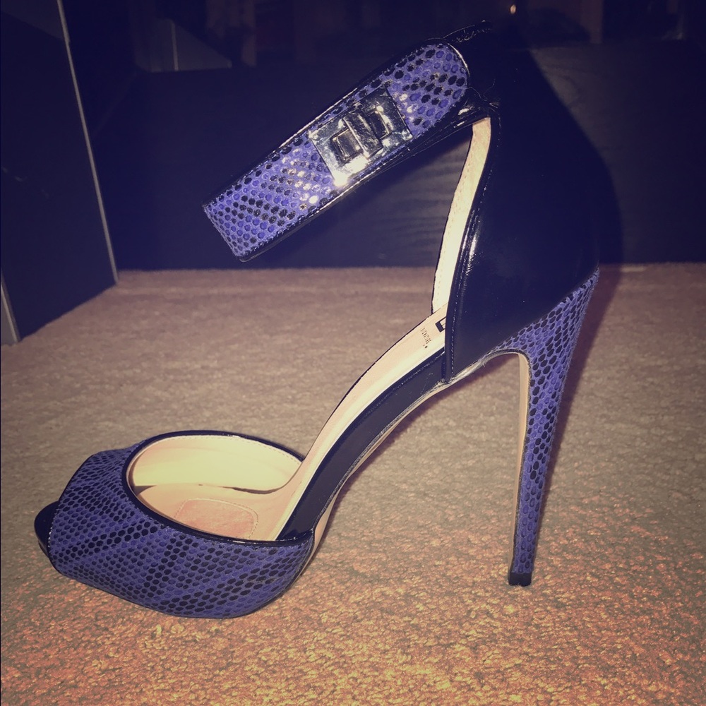 Peep toe snakeskin heels