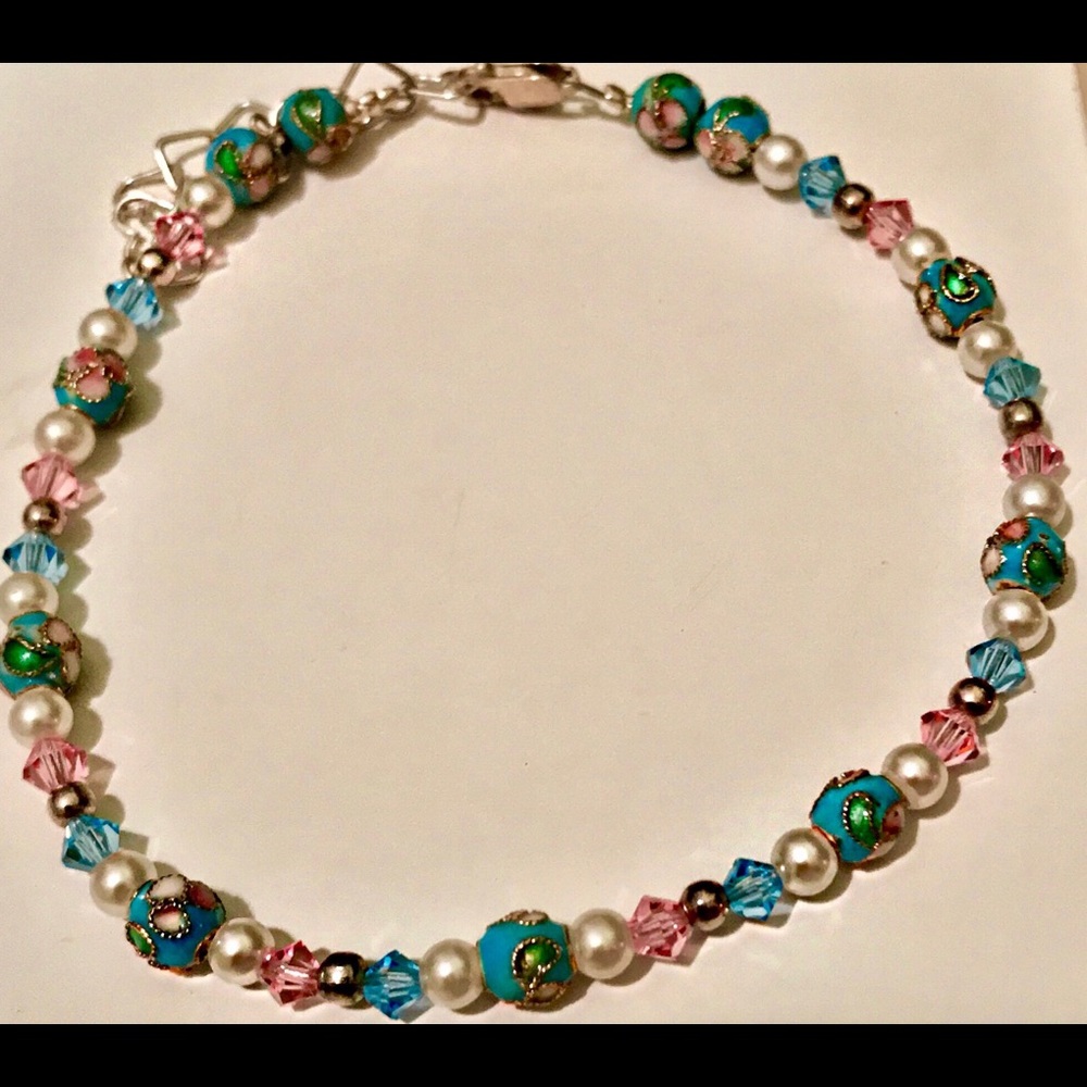 Beaded bracelet with a heart adjustable chain