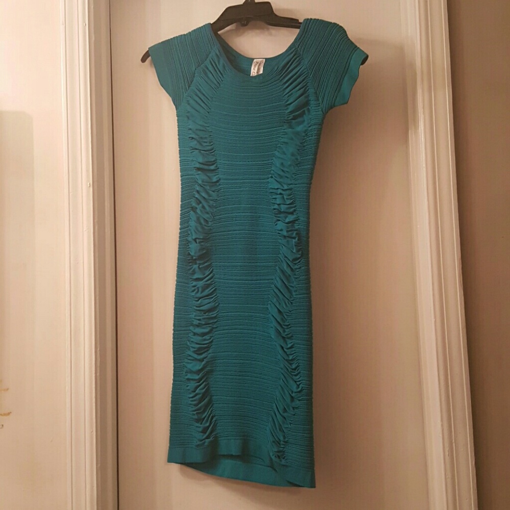 Teal form fitting scrunch dress/open back