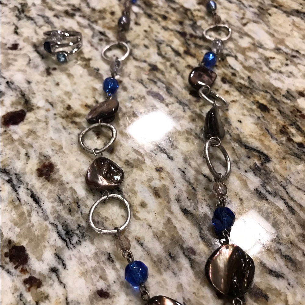 Necklace and ring/ Ring I believe is size 7.