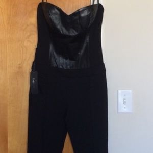 Leather BEBE pants jumpsuit. Has optional straps