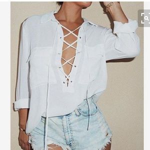 Whose loose top long sleeve lace up