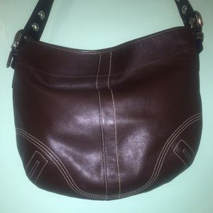 Brown leather coach hobo shoulder bag.