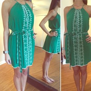 Green summer dress with white details