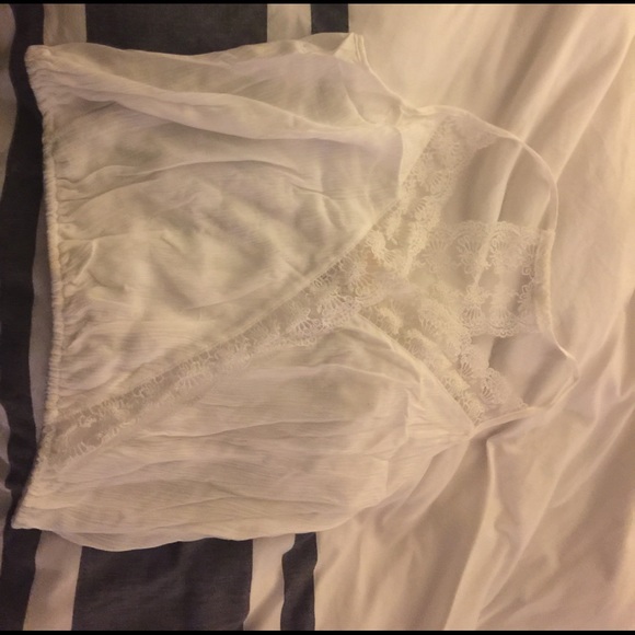 Wet Seal Tops - A white tank top with lace crossing patterns
