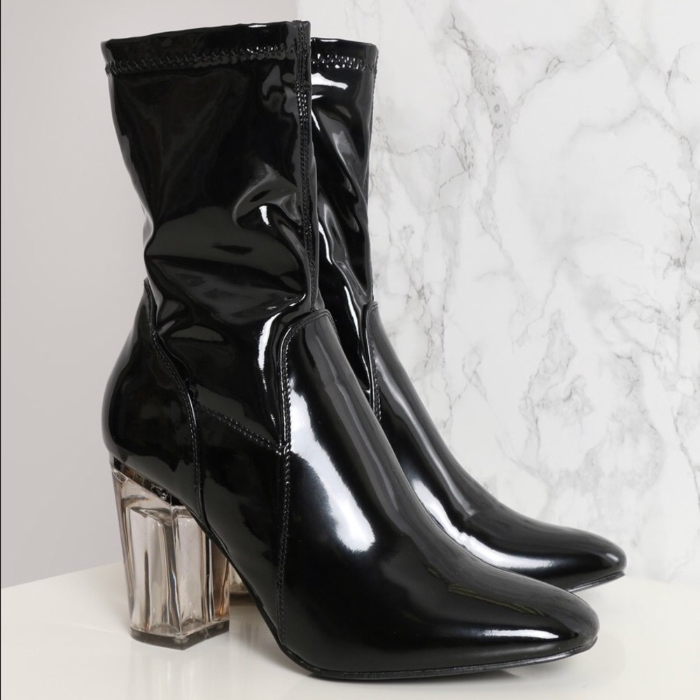 Size 7 black patent leather lucite heel boots.
