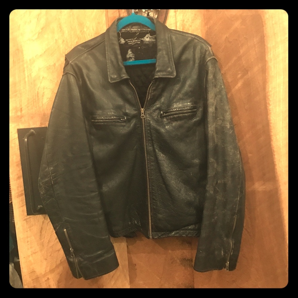 Unisex Black leather motorcycle jacket.
