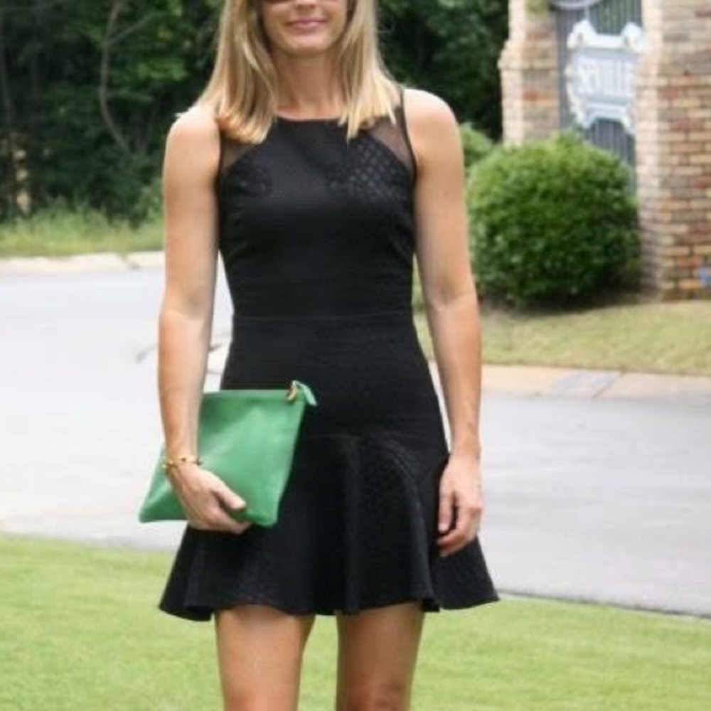 Black Parker fit and flare dress. Size XS