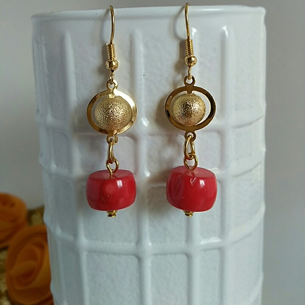 Red and gold dangle earrings