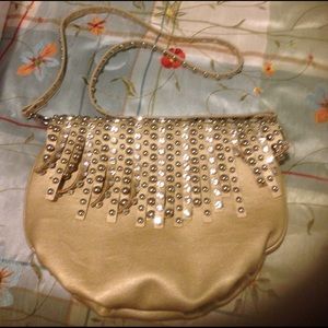 New without tag Gold studded handbag.