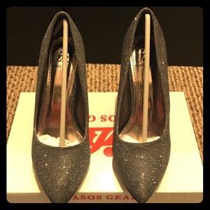 Brand new! Metallic gray heels in box size 7