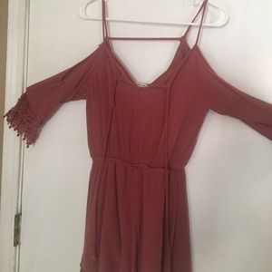 Romper that shows shoulders and ties in front