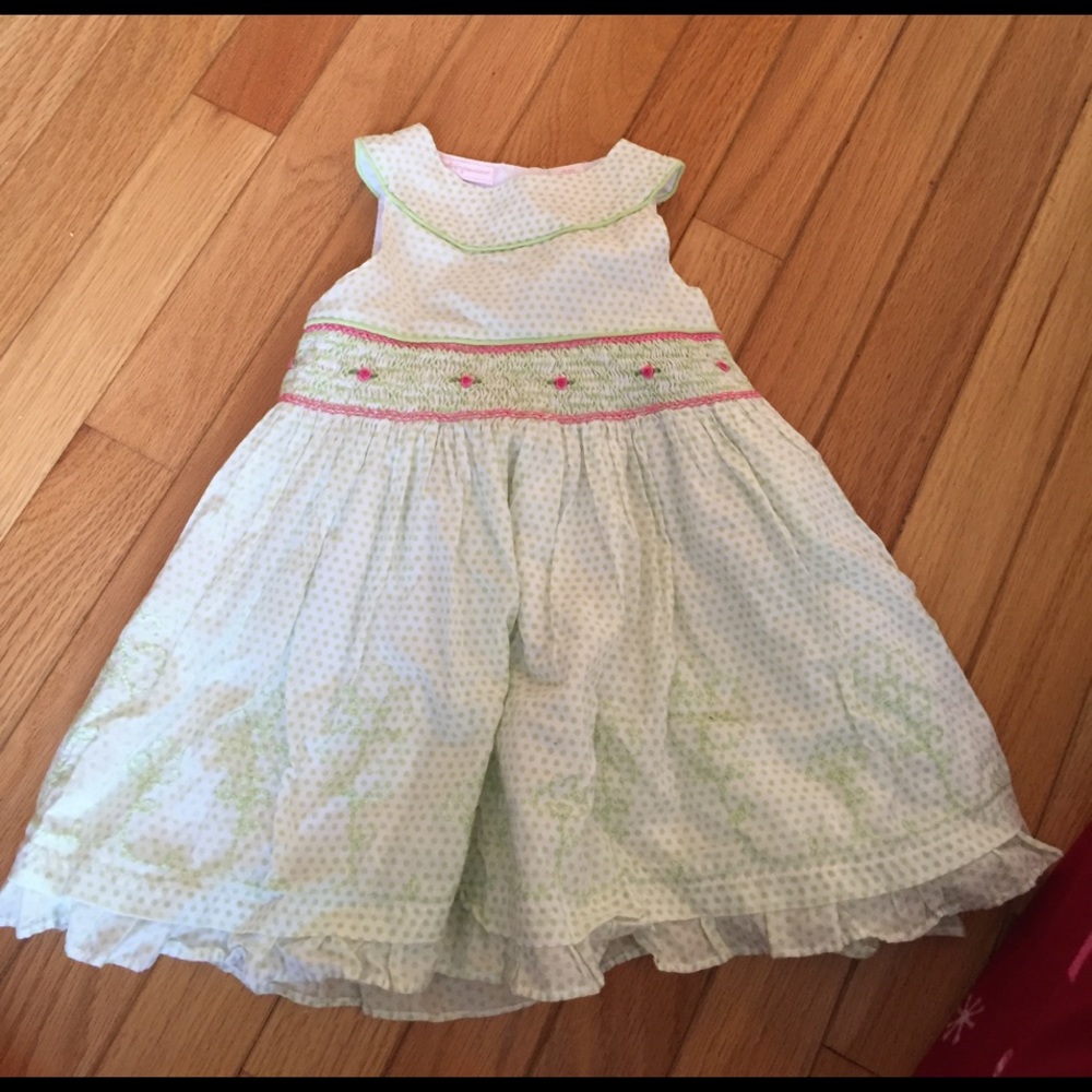 Green and white smocked dress