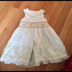 Green and white smocked dress