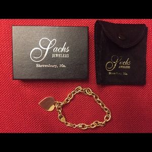 Gold 14K bracelet with heart Charm Sachs Jewelers