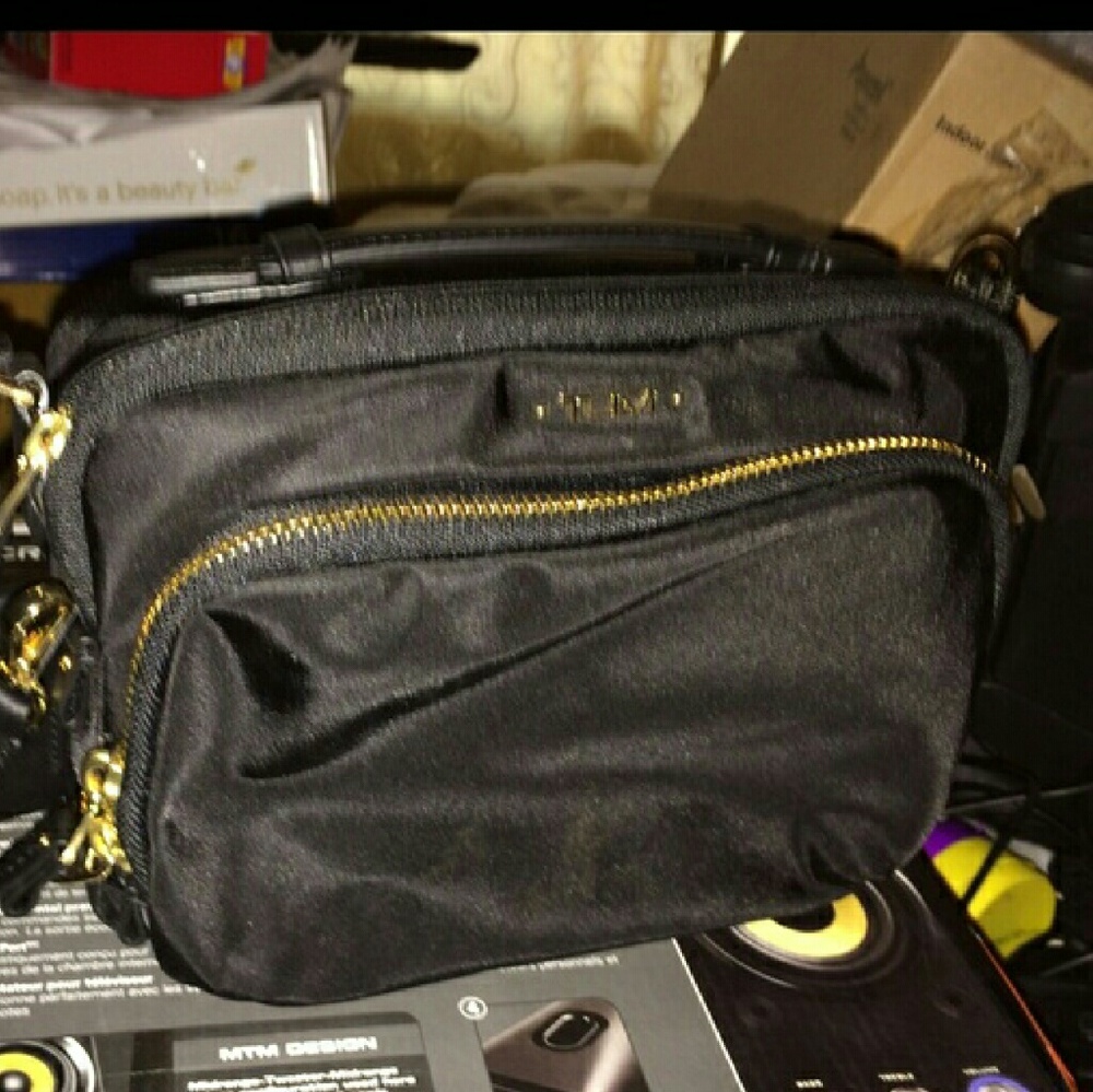 Tumi crossbody with chain