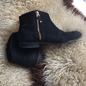 Also microsuede zip booties, black