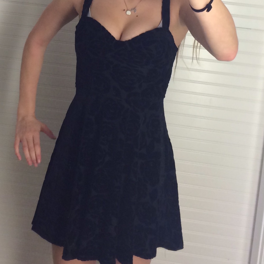 Black velvet dress with flower detailing