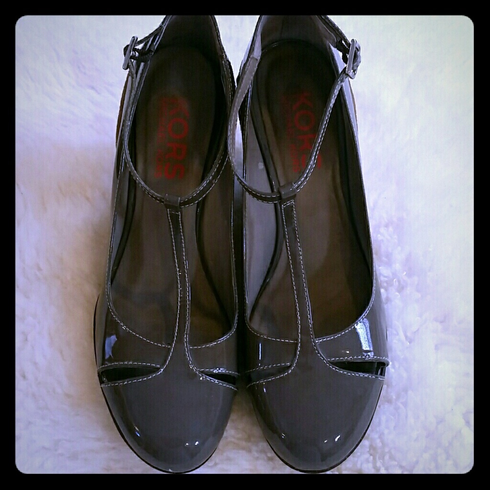 Kors Michael Kors taupe patent leather wedges.