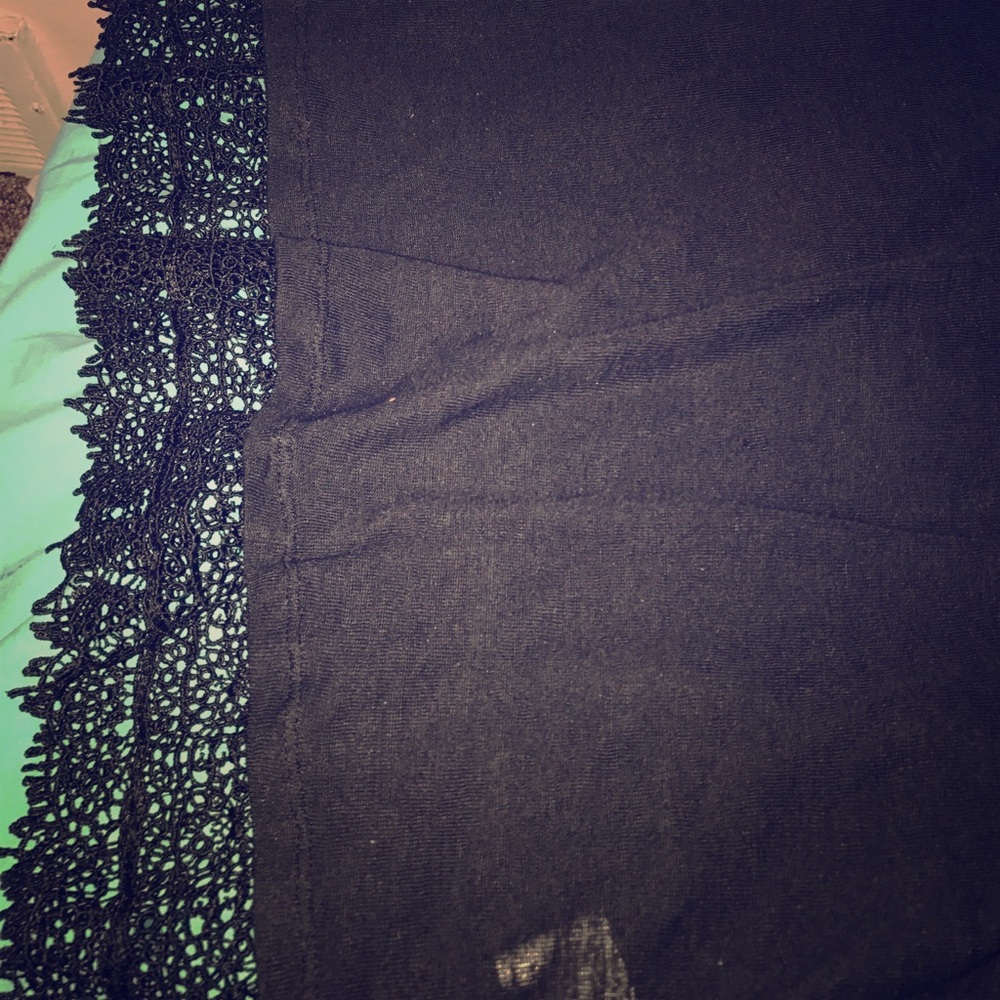 It's a black shirt with nice detail at the bottom