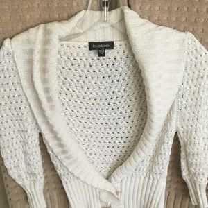 White Bebe sweater with gold buttons