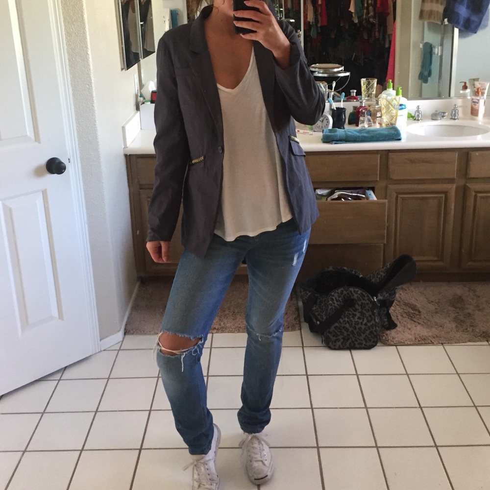Medium wash jeans with ripped knees