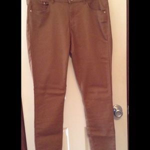 Women's caramel brown skinny jeans.