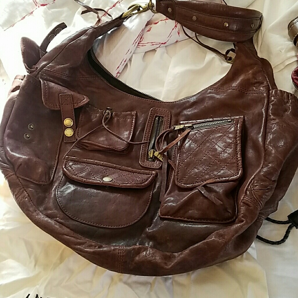 Andrew marc bag with dust bag as is. Top zipper