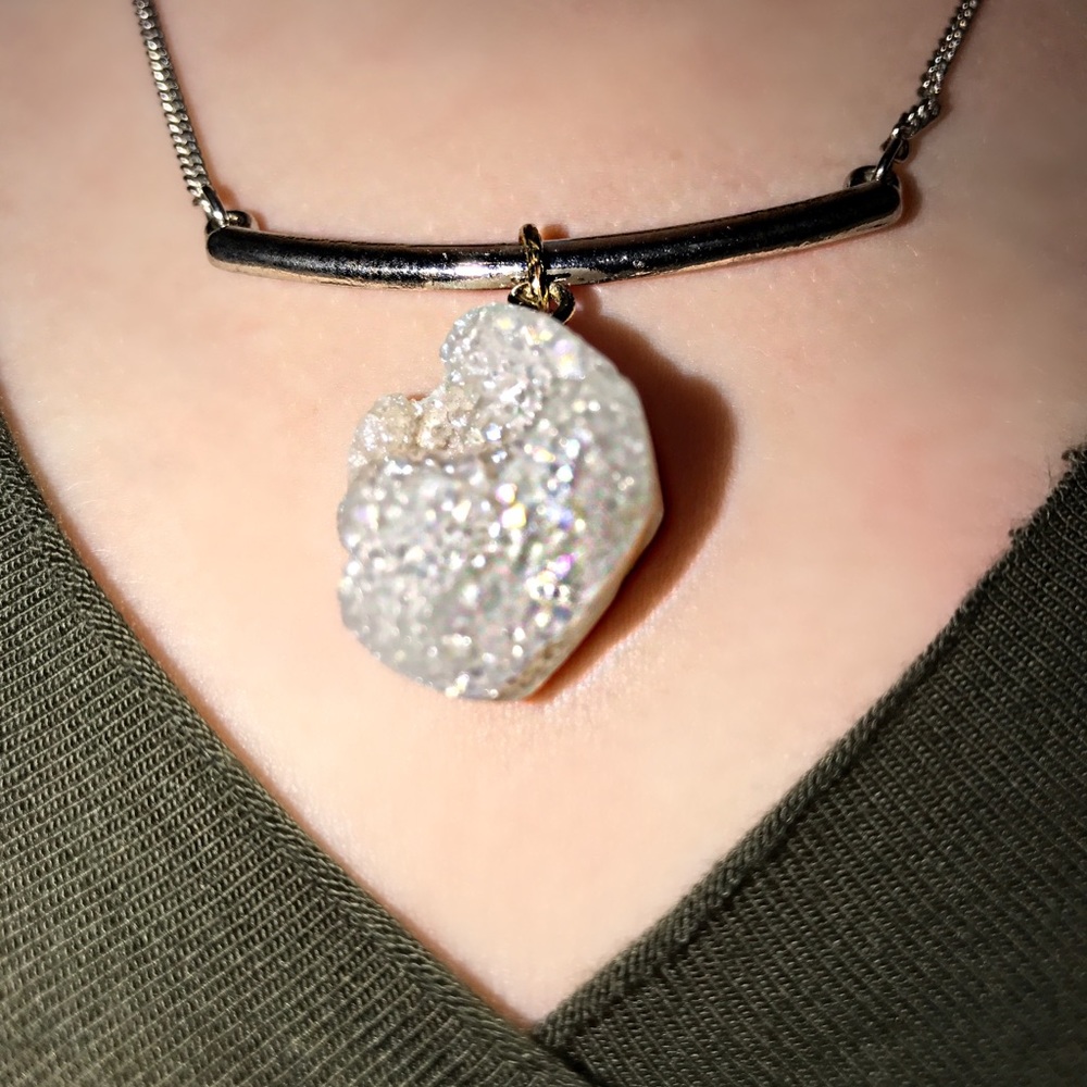 Crystal necklace attached to a silver bar.