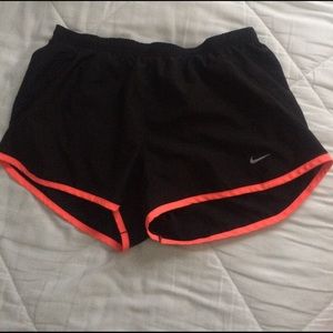 Black and pink Nike shorts