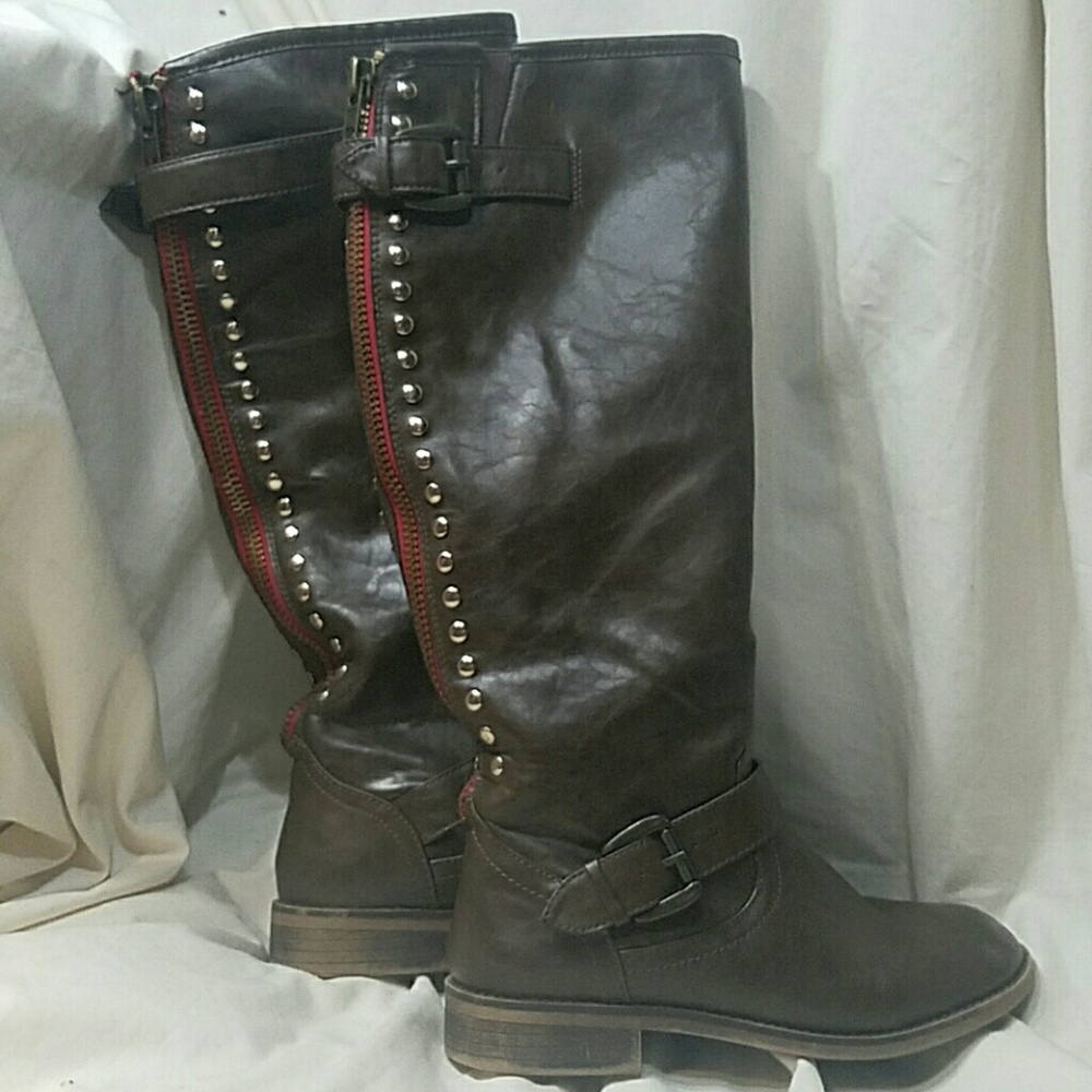 Tall red zipper accented boots