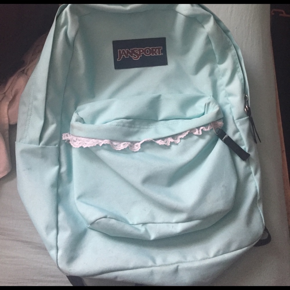 Light blue Jansport backpack with DIY lace