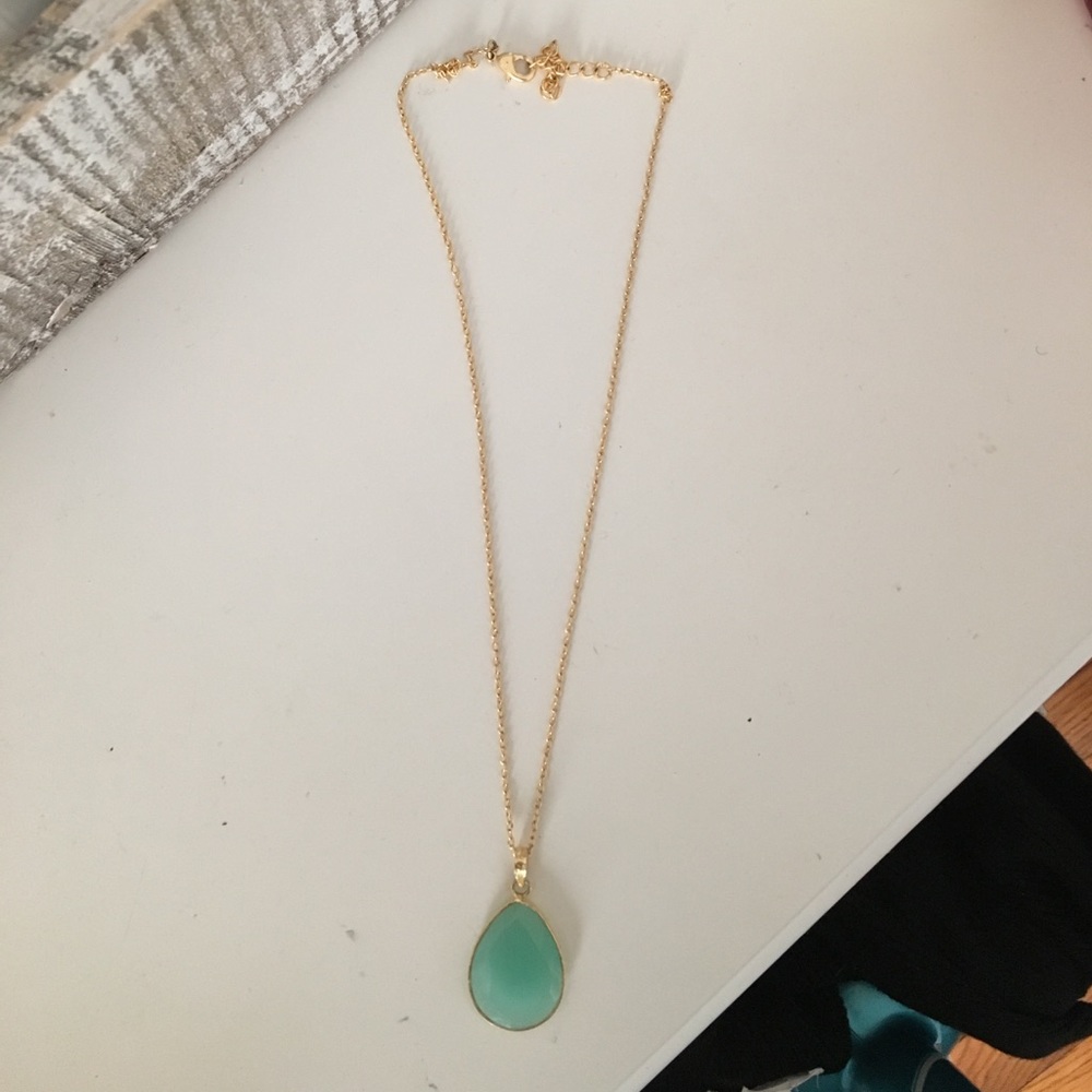 Gold necklace with teal jewel