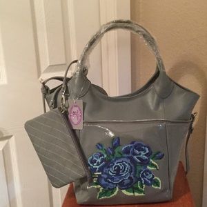 Sharif embroidered Rose genuine leather handbag.