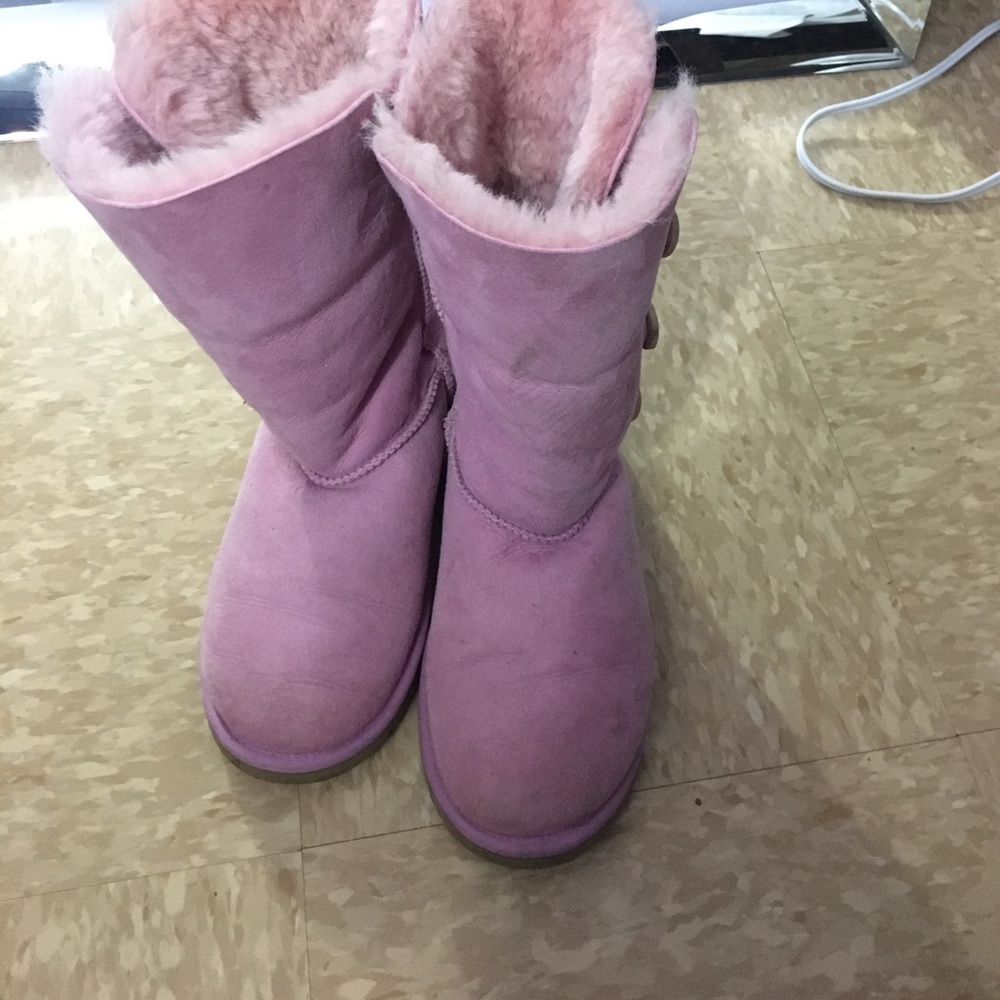 Pink button uggs used twice