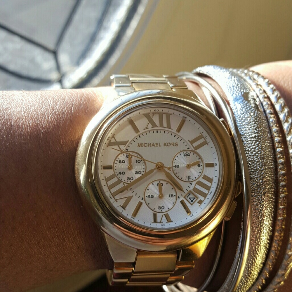 Authentic Michael Kors gold tone Camille watch.
