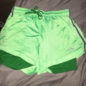 Green Nike shorts