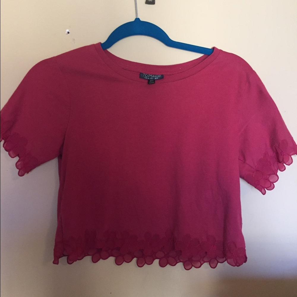Red crop top with mesh flowers at the bottom