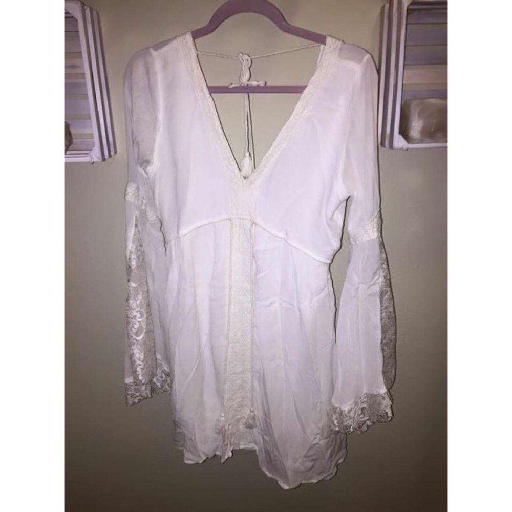 Long sleeve semi open back dress
