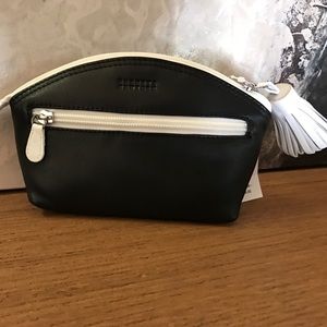 Super cute small cosmetic bag by Barney'S New York